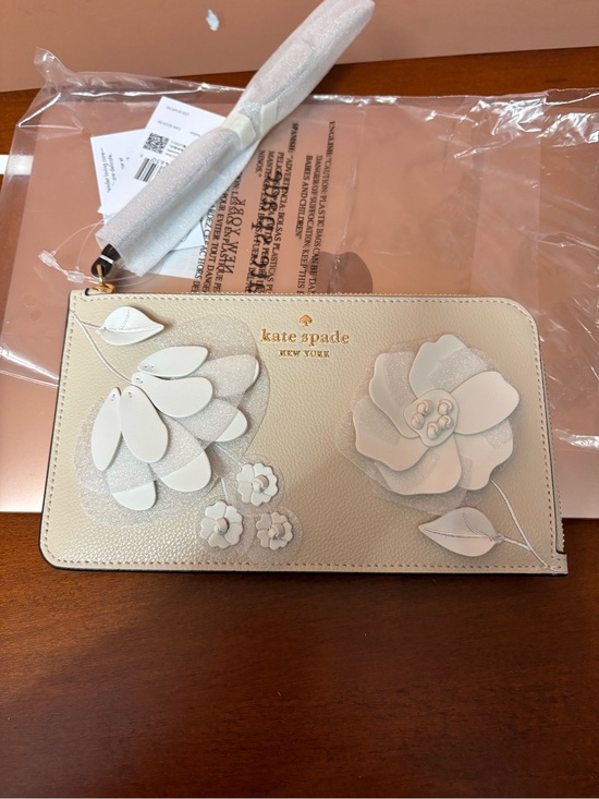 kate spade Handbags - kate spade Cream Floral Appliqué Leather Wristlet